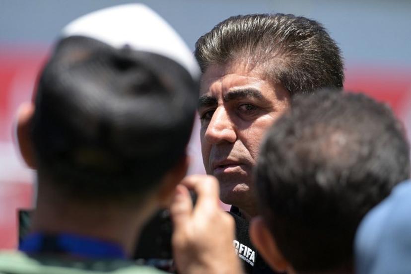 The secretary general of the Football Federation of Iran (FFIRI), Hedayat Mombeini, speaks with media during a training session ahead of Iran's FIFA World Cup 2026 Group G football match against Belgium at Centro Xoloitzcuintle in Tijuana on June 19, 2026.  Guillermo Arias / AFP