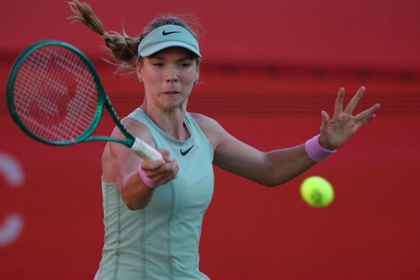 Britain's Katie Boulter returns against Kazakhstan's Elena Rybakina during their women's singles quarter-final tennis match at the HSBC WTA Championships at Queen's Club in west London on June 12, 2026.  Adrian Dennis / AFP