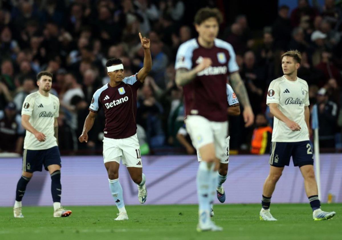 Aston Villa's English striker #11 Ollie Watkins celebrates scoring the opening goal during the UEFA Europa League, semi-final second-leg football match between Aston Villa and Nottingham Forest at Villa Park in Birmingham, central England on May 7, 2026.  Darren Staples / AFP