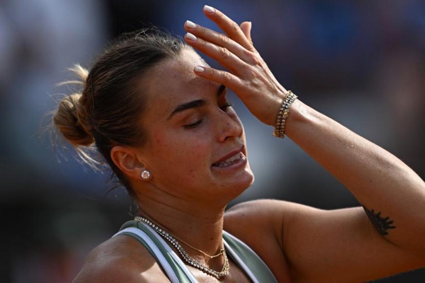 Belarus' Aryna Sabalenka reacts during her match against Romania's Sorana Cirstea during the WTA Rome Open tennis tournament at Foro Italico in Rome on May 9, 2026.   Tiziana FABI / AFP