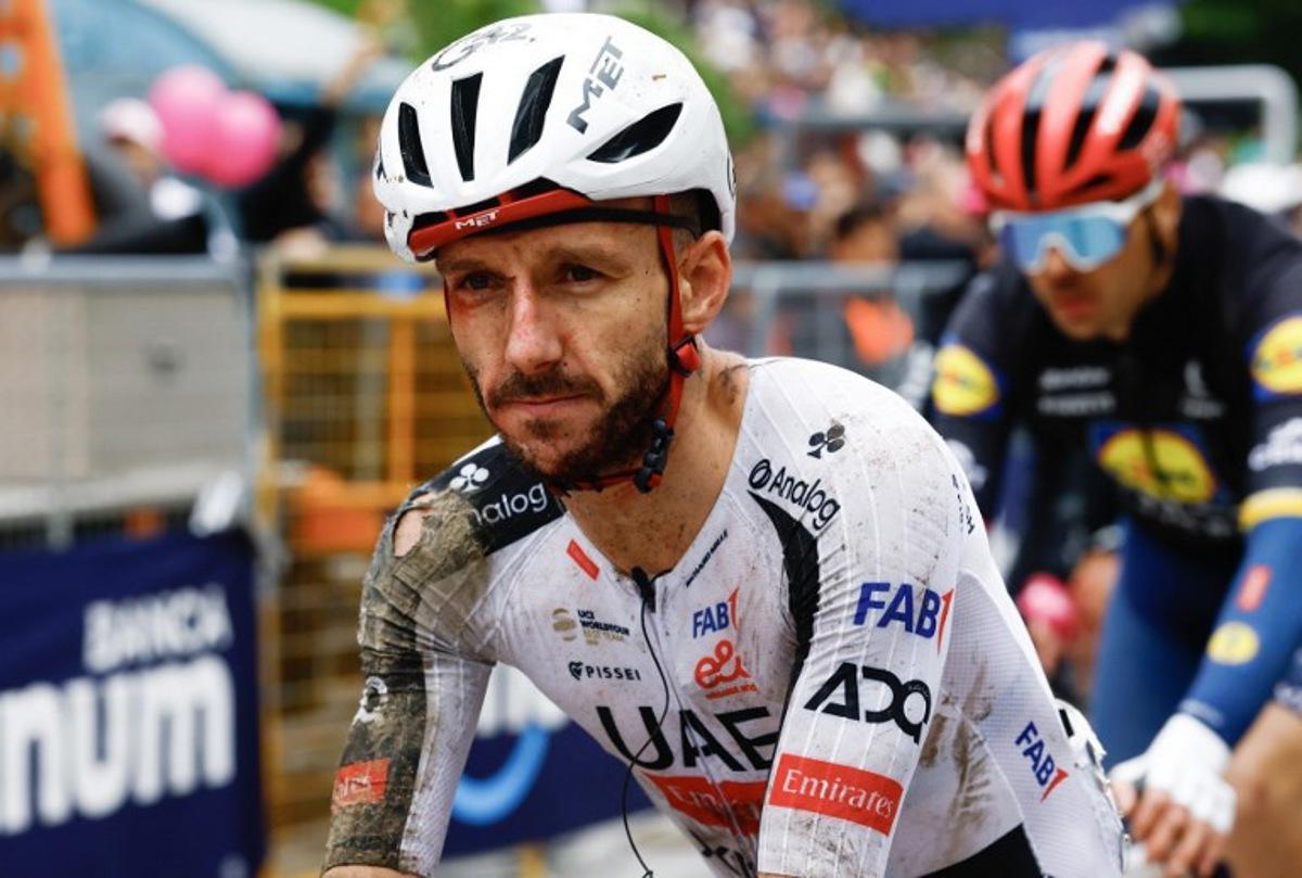 UAE Team Emirates - XRG British rider Adam Yates crossing the finish line after a crash in the 2nd stage of the Giro d'Italia 2026 - Tour of Italy cycling race between Burgas and Veliko Tarnovo, Bulgaria, on May 9, 2026.  Luca Bettini / AFP