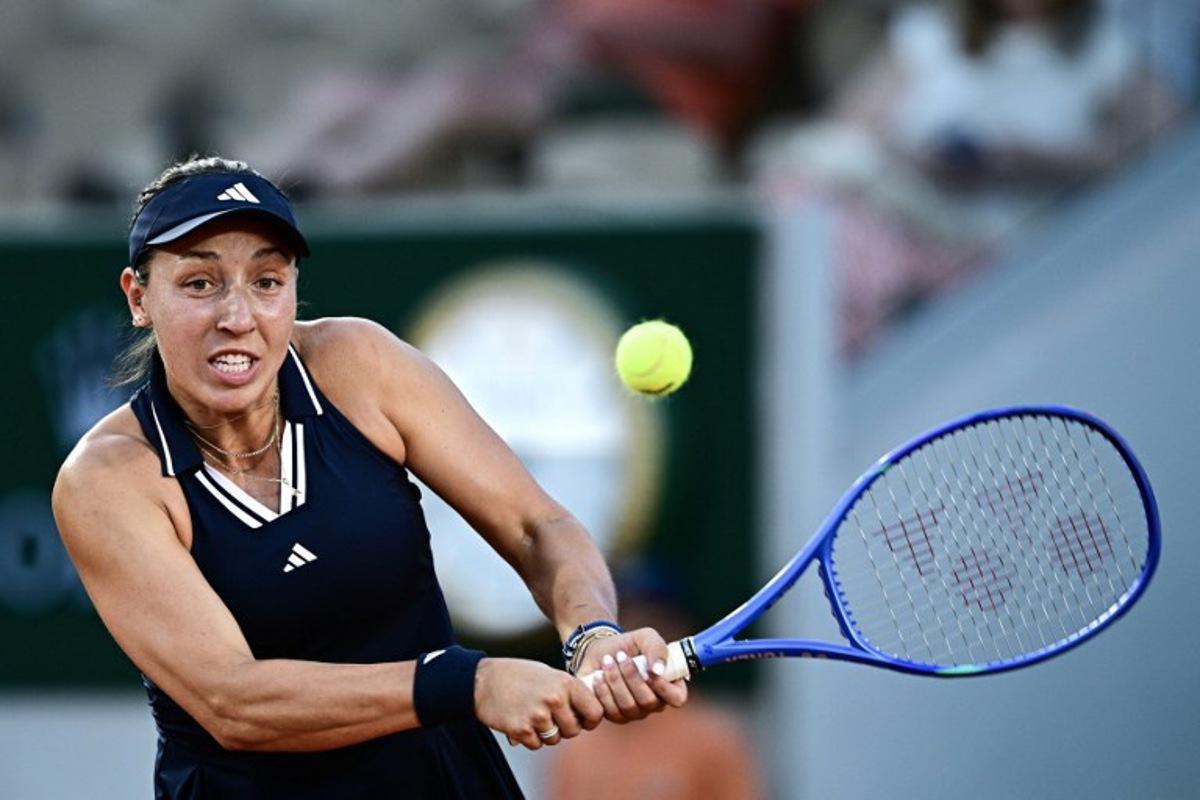 US Jessica Pegula plays a backhand return to Australia's Kimberly Birrell during their women's singles match on day 3 of the French Open tennis tournament on Court Simonne-Mathieu at the Roland-Garros Complex in Paris on May 26, 2026.  JULIEN DE ROSA / AFP