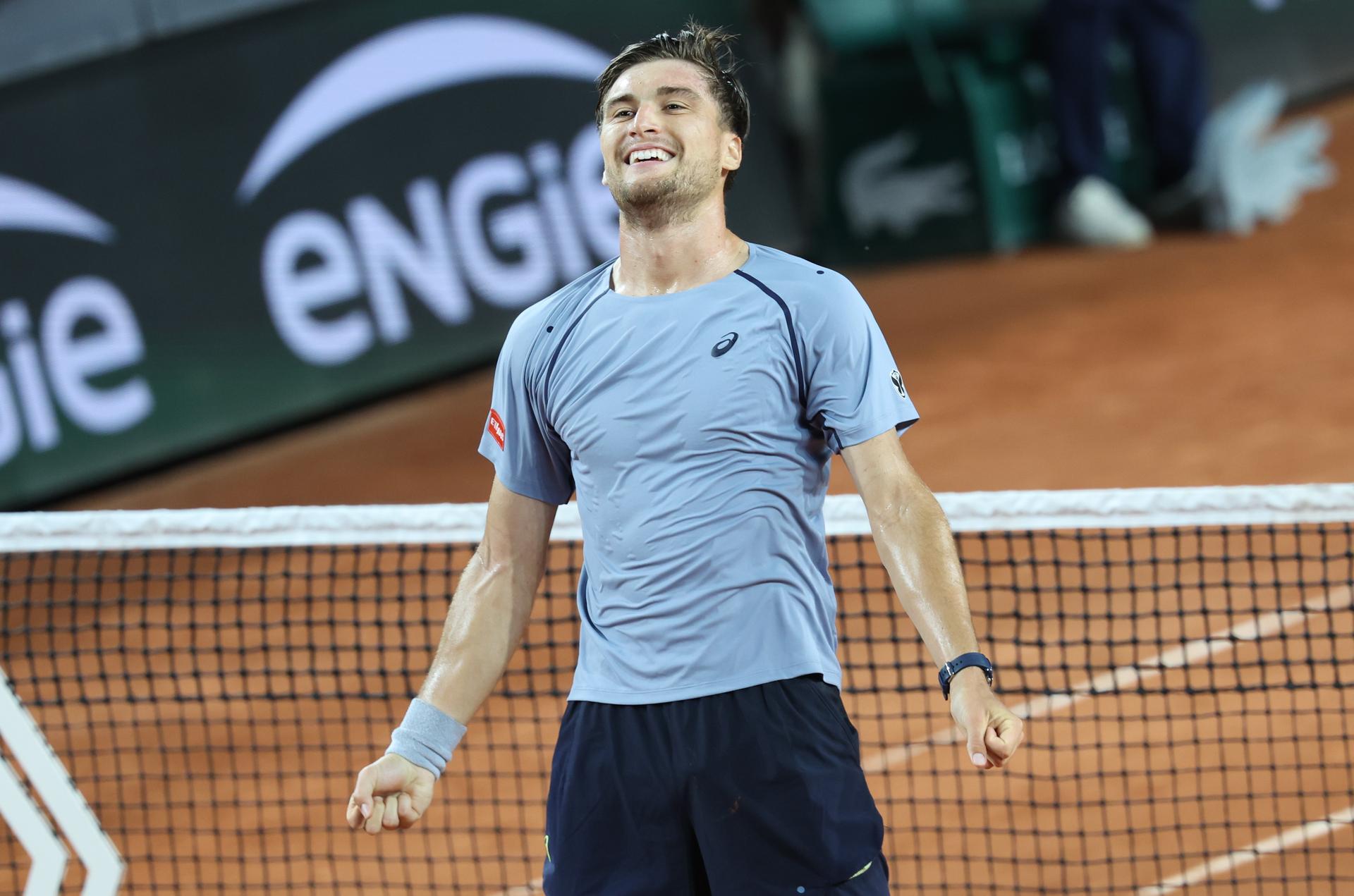 Belgian Raphael Collignon celebrates after winning a tennis match against US Shelton, in the second round of the men's singles at the Roland Garros French Open tennis tournament, in Paris, France, Thursday 28 May 2026. This year's tournament takes place from 18 May to 07 June. BELGA PHOTO VIRGINIE LEFOUR