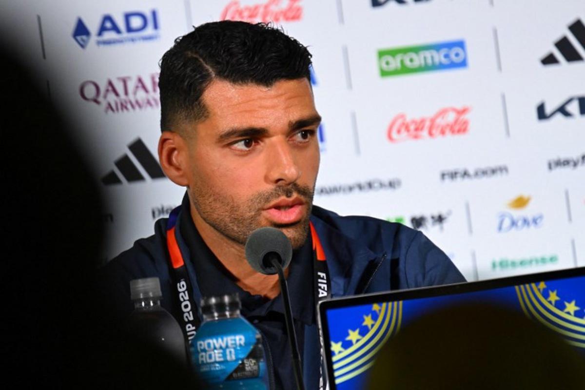 Iran's forward #09 Mehdi Taremi gives a press conference at Los Angeles Stadium in Inglewood on June 14, 2026, on the eve of the 2026 World Cup football match between Iran and New Zealand.  Patrick T. FALLON / AFP