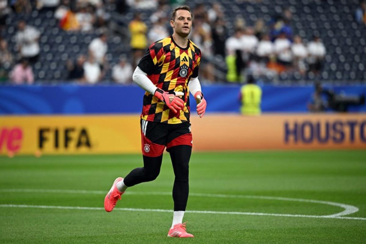 Germany's goalkeeper #1 Manuel Neuer takes part in the warm-up ahead of the 2026 World Cup Group E football match between Germany and Curacao at the Houston Stadium in Houston on June 14, 2026.    Paul ELLIS / AFP
