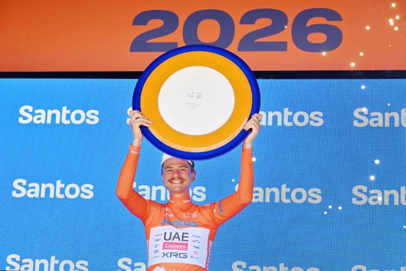 UAE Team Emirates XRG's Australian rider Jay Vine holds the winners trophy at the end of the Tour Down Under UCI men's cycling race in Adelaide on January 25, 2026.   Brenton Edwards / AFP