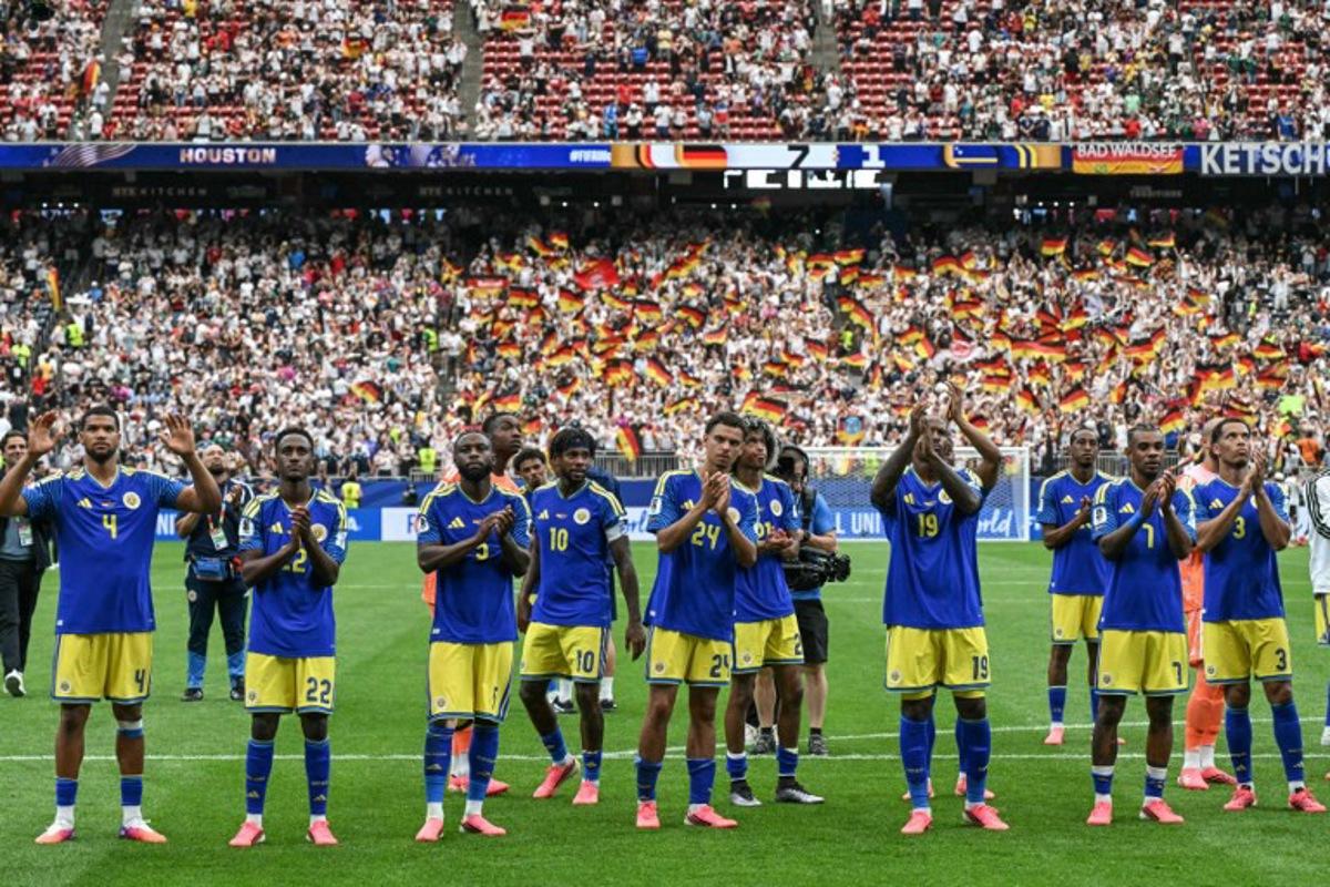 Curacao's players react after losing during the 2026 World Cup Group E football match between Germany and Curacao at the Houston Stadium in Houston on June 14, 2026.   RONALDO SCHEMIDT / AFP