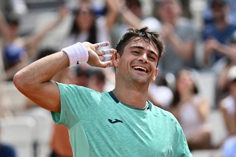 Argentine's Mariano Navone celebrates after winning the first set against Canada's Felix Auger Aliassime during the ATP Rome Open tennis tournament at Foro Italico in Rome on May 9, 2026.   Filippo MONTEFORTE / AFP