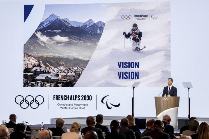 French Alps 2030 Olympics President Edgar Grospiron speaks during the 144th session of the International Olympic Committee (IOC), in Costa Navarino, Greece, on the election day of the next IOC President, on March 20, 2025.   Fabrice COFFRINI / AFP