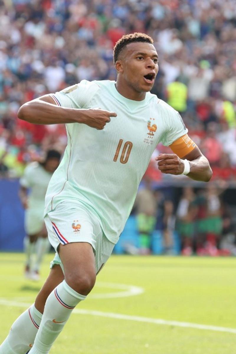 France's forward #10 Kylian Mbappe celebrates scoring his team's first goal during the 2026 World Cup football tournament quarter-final match between France and Morocco at Boston Stadium in Foxborough on July 9, 2026.   Odd ANDERSEN / AFP