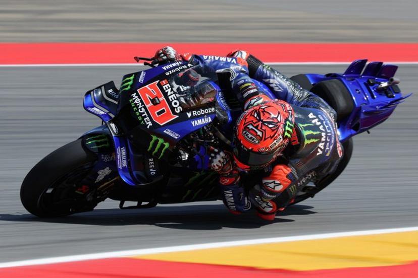 Monster Energy Yamaha MotoGP's French rider Fabio Quartararo takes a curve during the first free practice session of the MotoGP Aragon Grand Prix at the Motorland circuit in Alcaniz, northeastern Spain, on June 6, 2025.   LLUIS GENE / AFP