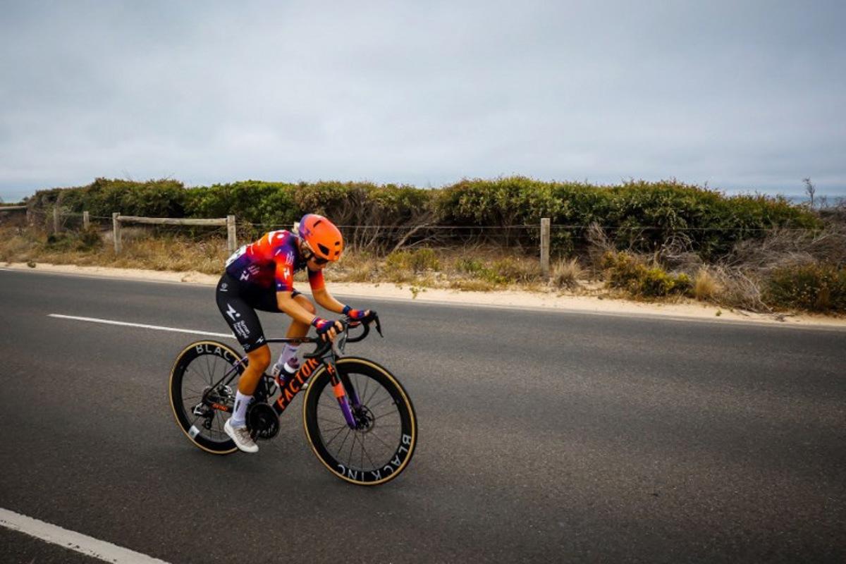 Human Powered Health's Swiss cyclist Petra Stiasny breaks away from the peloton during the women's elite cycling event of the 2026 Cadel Evans Great Ocean Road Race in Geelong on January 31, 2026.   CHRIS PUTNAM / AFP