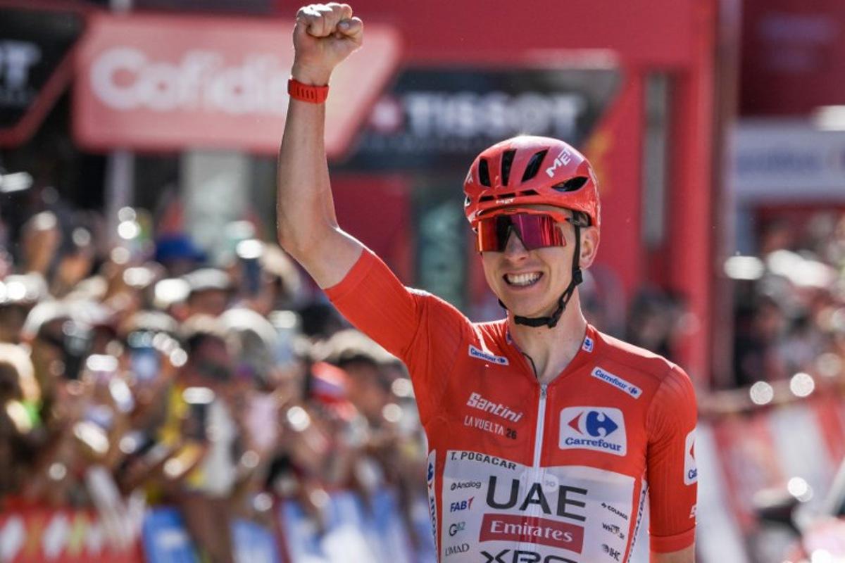 Team UAE's Slovenian rider Tadej Pogacar celebrates as he crosses the finish line to win the fourth stage of the Vuelta a Espana 2026, a 104,8 km race between Andorra-la-Vella and Andorra-la-Vella on August 25, 2026.    Ed JONES / AFP