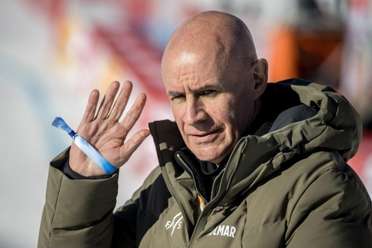FIS President Johan Eliasch waves at the end of the FIS Alpine Ski World Cup 2025-2026, in St Moritz, south-eastern Switzerland on December 13, 2025. Fabrice COFFRINI / AFP