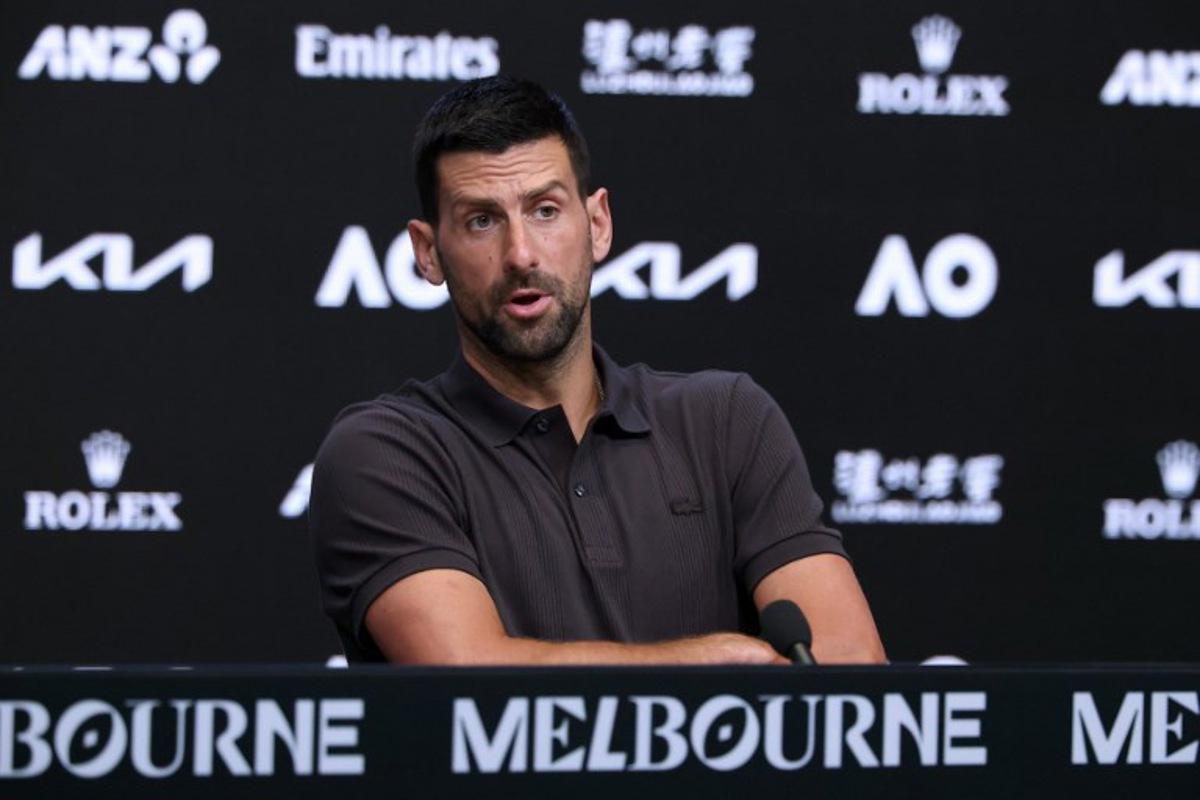 Serbia's Novak Djokovic speaks at a press conference ahead of the 2026 Australian Open tennis tournament in Melbourne on January 17, 2026. DAVID GRAY / AFP