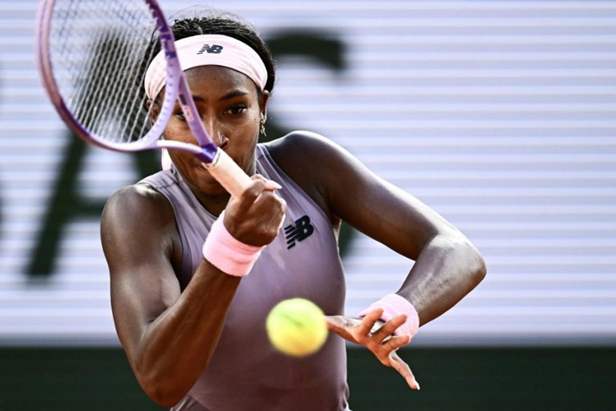 US Coco Gauff plays a forehand return to Austria's Anastasia Potapova during their women's singles match on day 7 of the French Open tennis tournament on Court Philippe-Chatrier at the Roland-Garros Complex in Paris on May 30, 2026. JULIEN DE ROSA / AFP