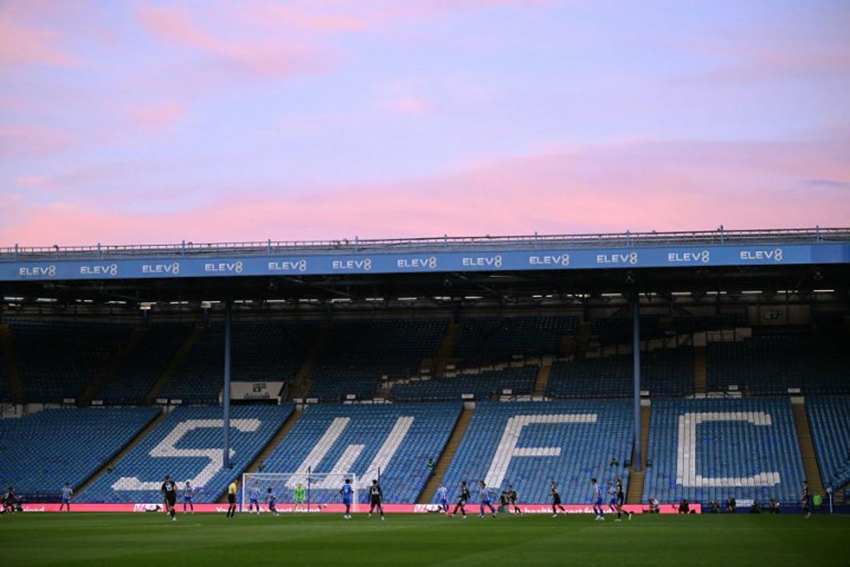 Empty seats due to a protest against Sheffield Wednesday's Thai owner Dejphon Chansiri, are seen during the English League Cup second round football match between Sheffield Wednesday and Leeds United at The Hillsborough Stadium in Sheffield, northern England on August 26, 2025. Oli SCARFF / AFP