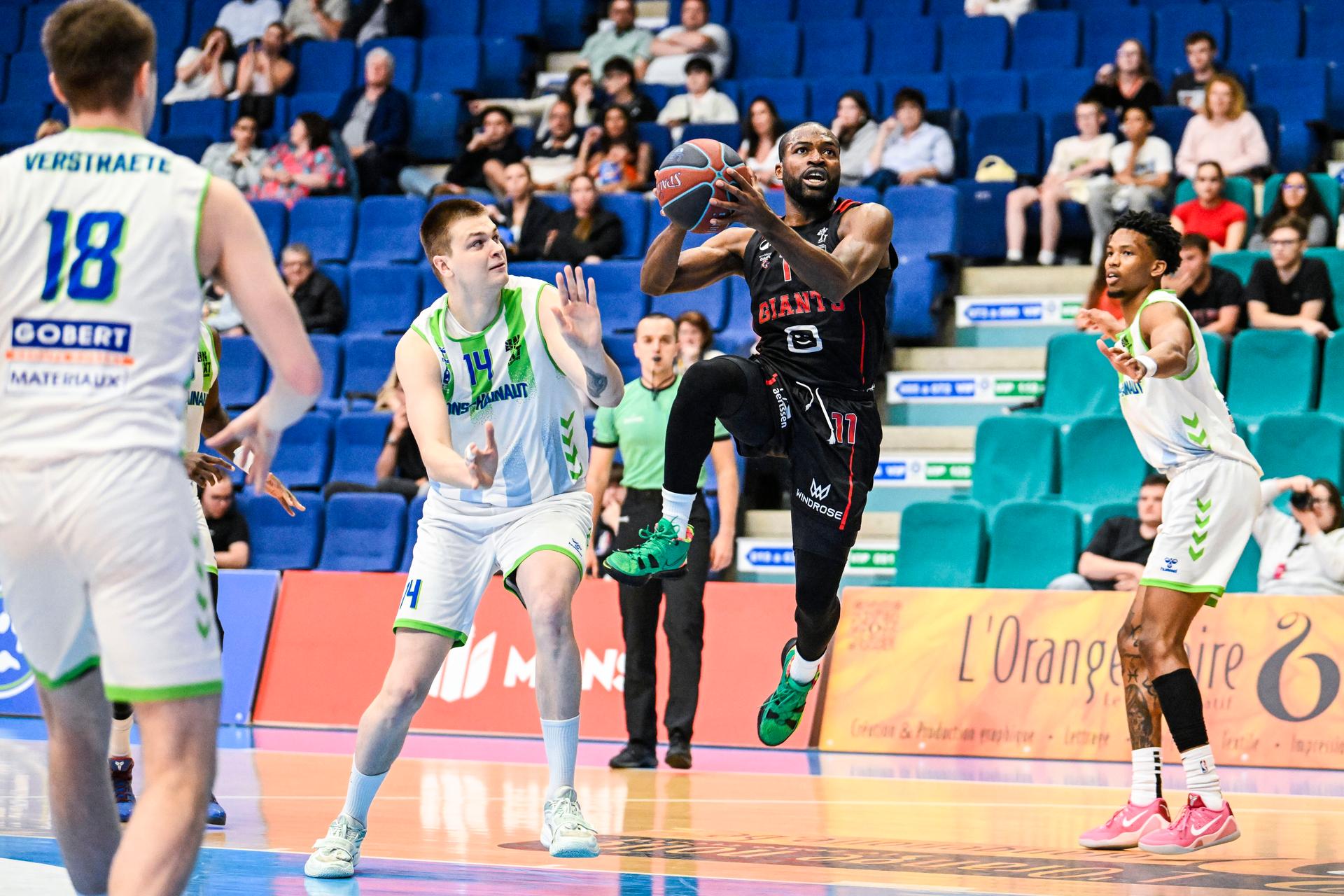 Mons' Matis Mikus and Antwerp's Joel Murray pictured in action during a basketball match between Union Mons-Hainaut and Antwerp Giants, Saturday 02 May 2026 in Mons, on matchday 32/34 in the 'BNXT League' Belgian/ Dutch first division basket championship. BELGA PHOTO TOM GOYVAERTS