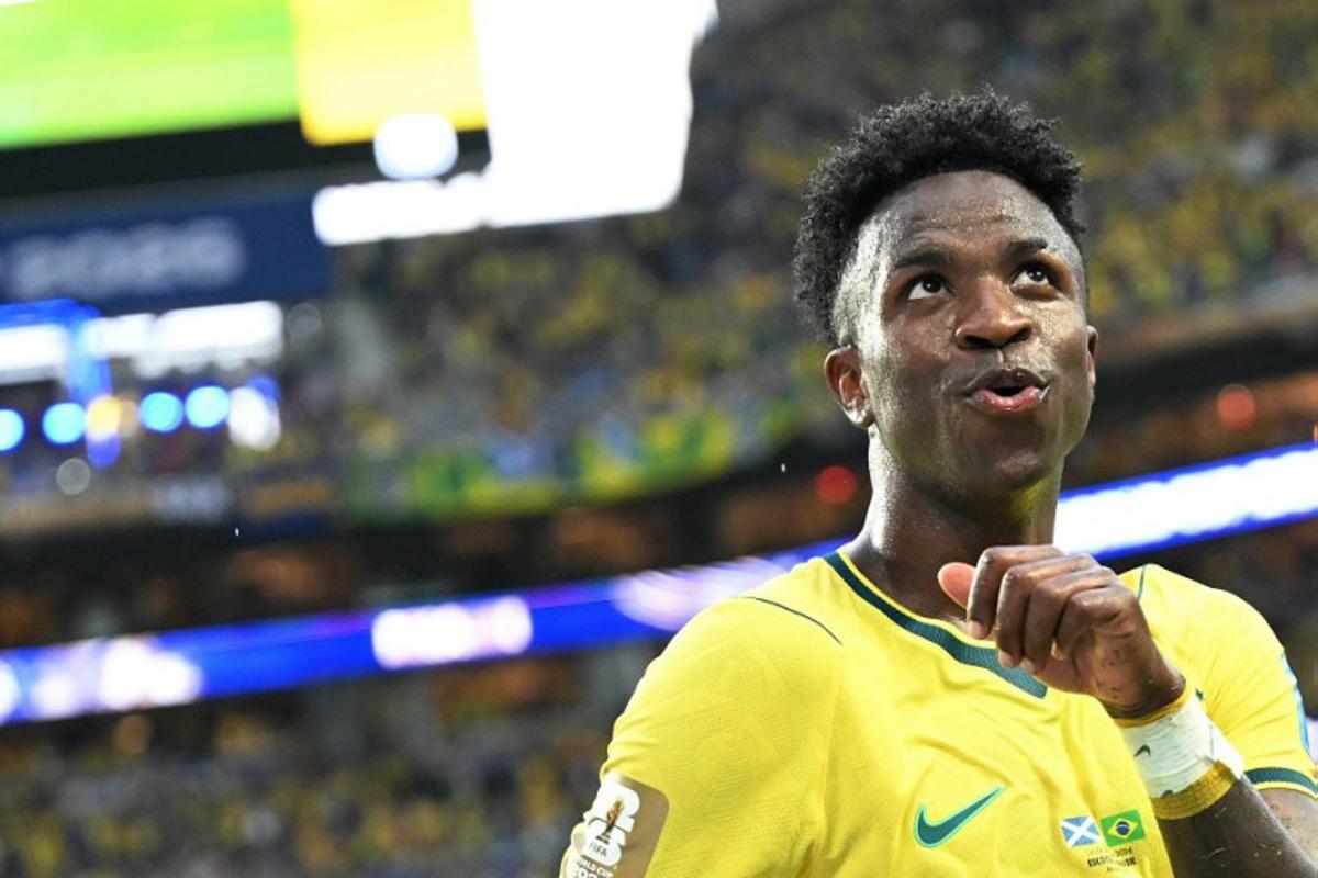 Brazil's forward #07 Vinicius Junior celebrates after scoring his team's second goal during the 2026 World Cup Group C football match between Scotland and Brazil at the Miami Stadium in Miami Gardens on June 24, 2026. CHANDAN KHANNA / AFP
