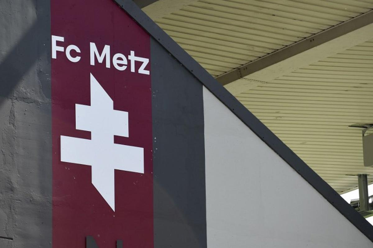 This photograph taken on August 8, 2021 shows the FC Metz new logo, displayed on the stadium before the start of the French L1 football match between FC Metz and Lille OSC at Stade Saint-Symphorien in Longeville-les-Metz, northern France. JEAN-CHRISTOPHE VERHAEGEN / AFP