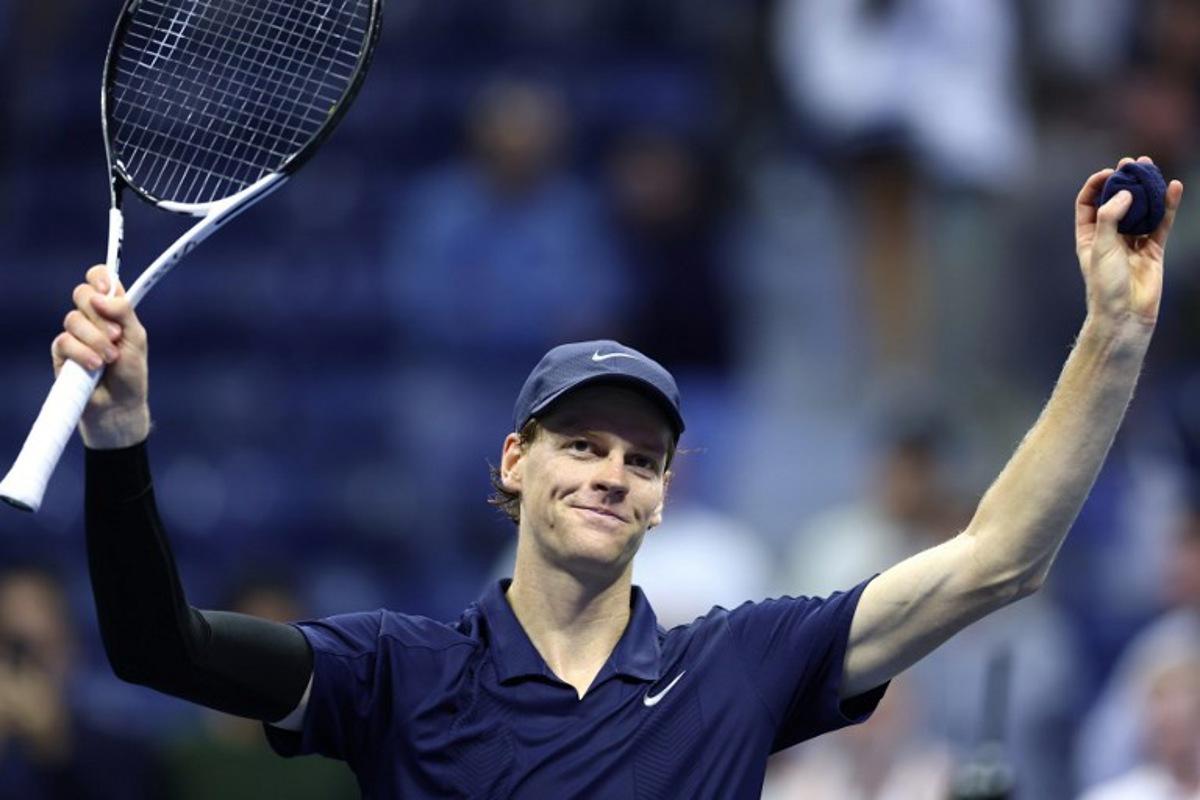 Italy's Jannik Sinner celebrates after defeating Italy's Lorenzo Musetti during their men's singles quarterfinal tennis match on day eleven of the US Open tennis tournament at the USTA Billie Jean King National Tennis Center in New York City, on September 3, 2025. CHARLY TRIBALLEAU / AFP