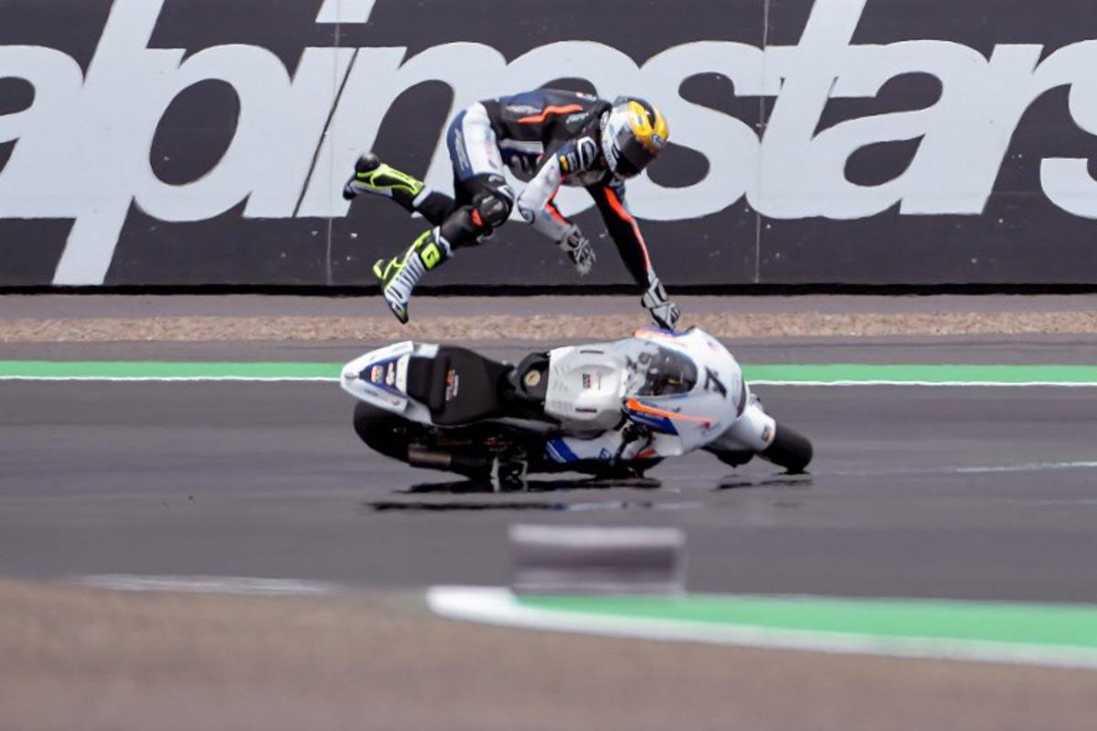 RW Racing GP Team's Belgian rider Barry Baltus crashes during the qualifying session for the Indonesian Grand Prix Moto2 race at the Mandalika International Circuit at Kuta Mandalika in Central Lombok on March 19, 2022. BAY ISMOYO / AFP