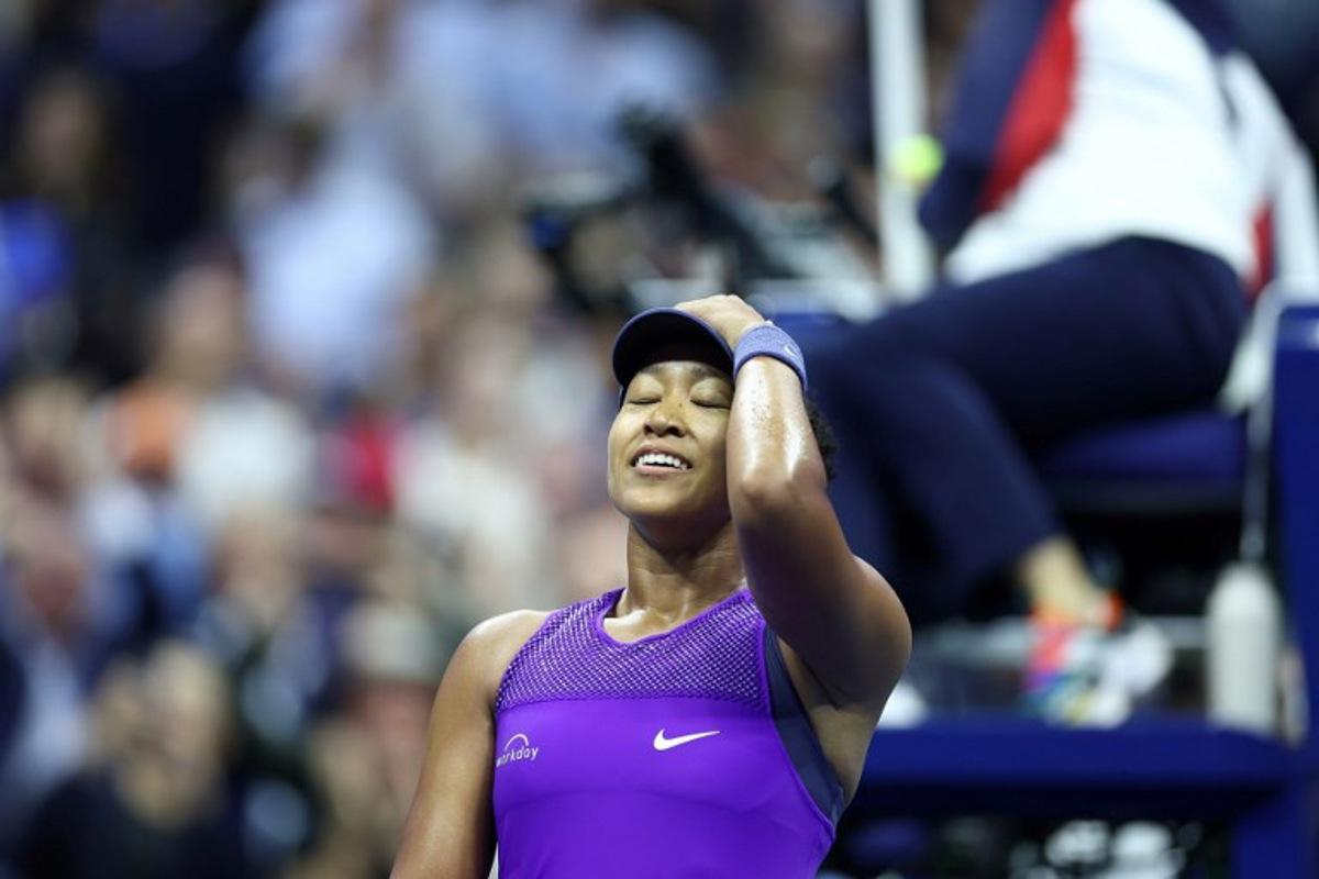 Japan's Naomi Osaka celebrates defeating Czech Republic's Karolina Muchova in their women's singles quarterfinal tennis match on day eleven of the US Open tennis tournament at the USTA Billie Jean King National Tennis Center in New York City on September 3, 2025. CHARLY TRIBALLEAU / AFP