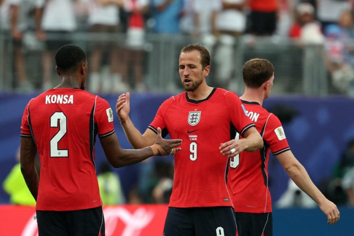 England's forward #09 Harry Kane greets England's defender #02 Ezri Konsa at the end of the 2026 World Cup Group L football match between Panama and England at the New York/New Jersey Stadium in East Rutherford on June 27, 2026. FRANCK FIFE / AFP