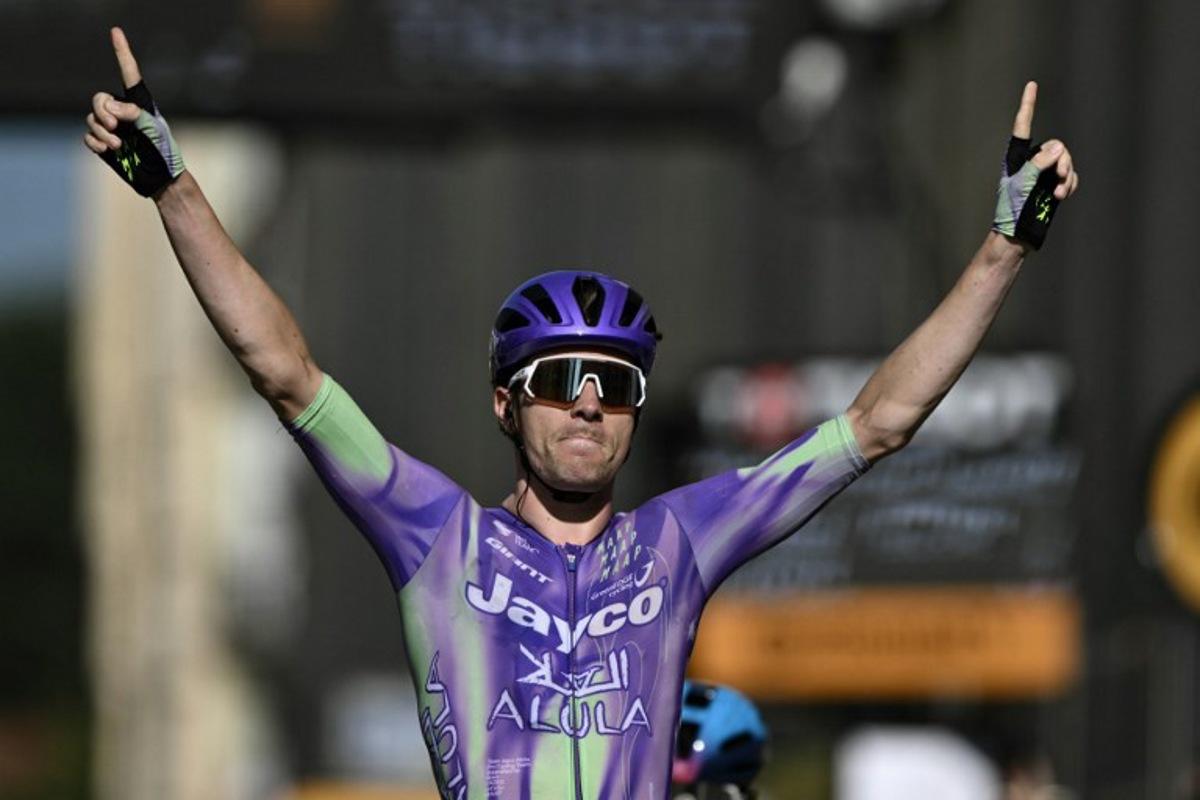 Team Jayco AlUla's Swiss rider Mauro Schmid cycles to the finish line to win the 13th stage of the 113th edition of the Tour de France cycling race, 205,8 km between Dole and Belfort in eastern France, on July 17, 2026. Jeff PACHOUD / AFP