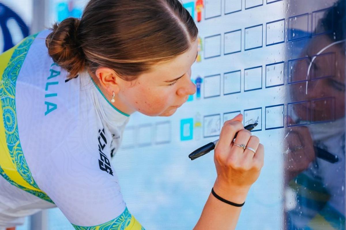 Australia's Talia Appleton of the ARA Australian Cycling Team signs on before the women's elite cycling event of the 2025 Cadel Evans Great Ocean Road Race in Geelong on February 1, 2025. CHRIS PUTNAM / AFP