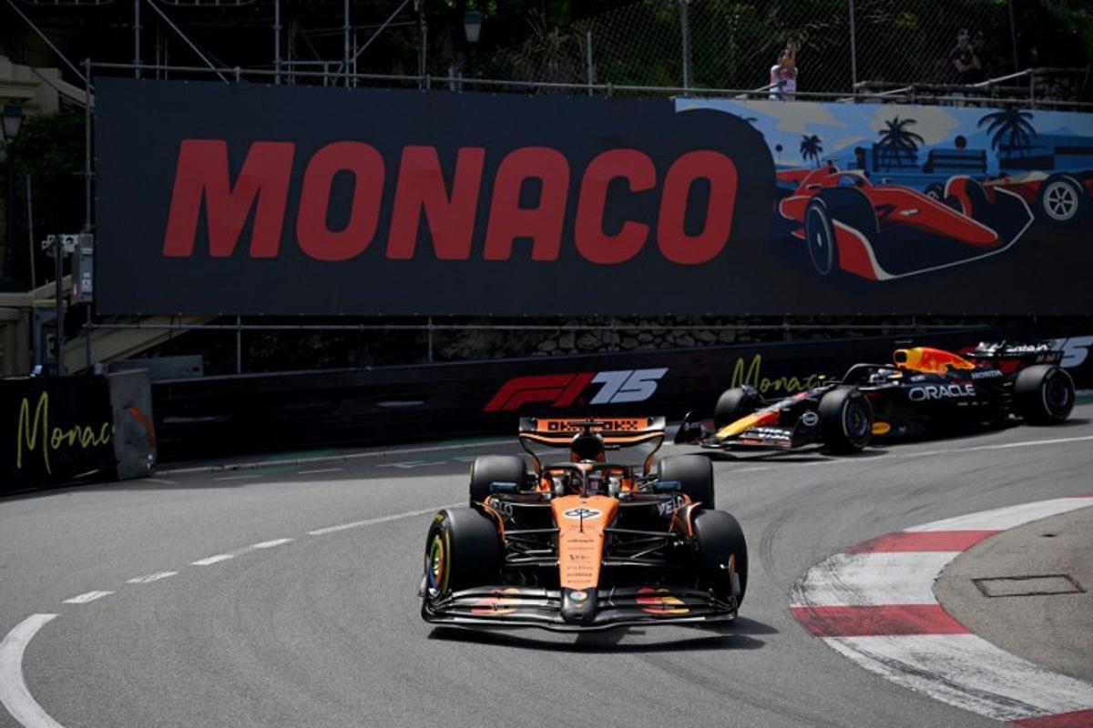 McLaren's Australian driver Oscar Piastri (C) races ahead of Red Bull Racing's Dutch driver Max Verstappen (R) during the Formula One Monaco Grand Prix at the Circuit de Monaco, on May 25, 2025. Christophe Simon / AFP