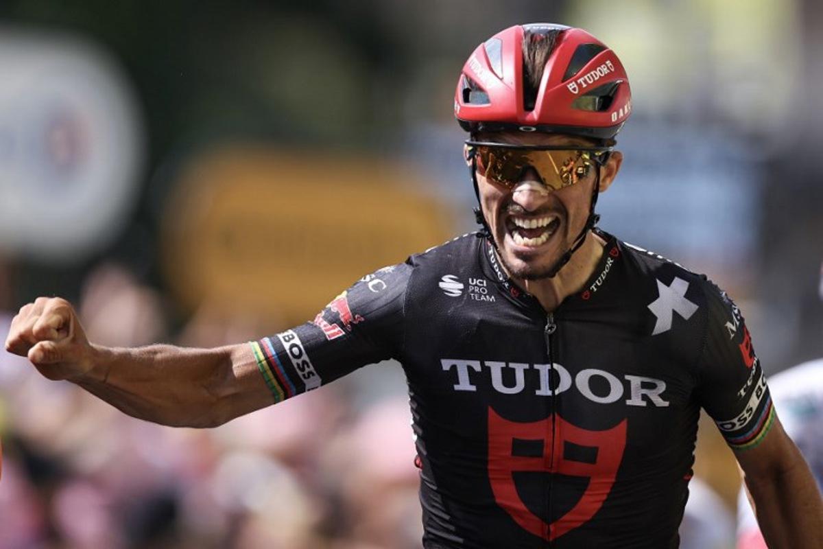 Tudor Pro Cycling Team's French rider Julian Alaphilippe cycles to the finish line to place third in the 15th stage of the 112th edition of the Tour de France cycling race, 169.3 km between Muret and Carcassonne, southwestern France, on July 20, 2025. Anne-Christine POUJOULAT / AFP