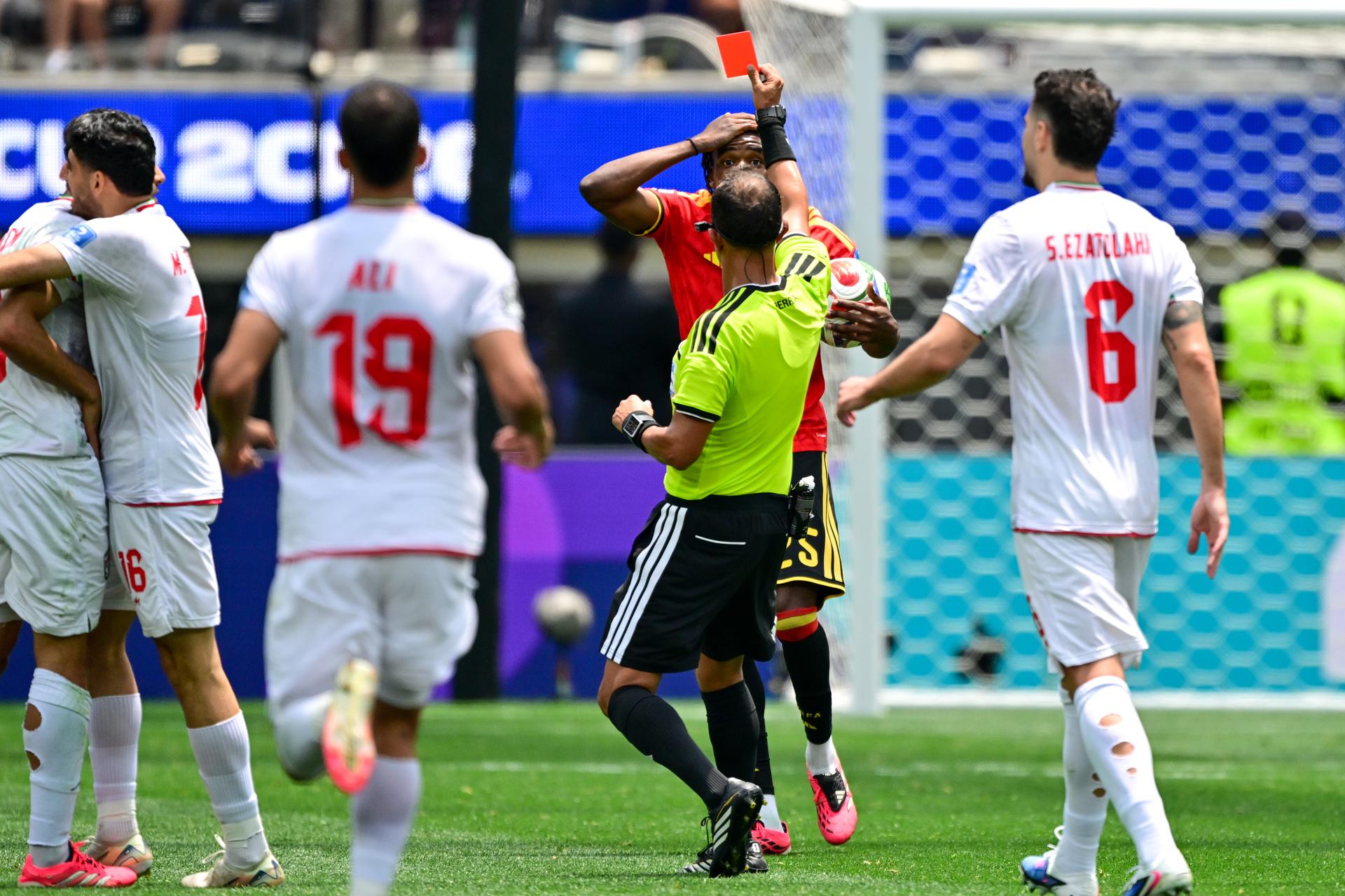 Belgium's Nathan Ngoy receives a red card from the referee during a soccer game between Belgian national team Red Devils and Iran, on Sunday 21 June 2026, at the SoFi stadium in Los Angeles, the second game in the group stage of the FIFA World Cup 2026 in the United States of America. The Diables Rouges - Rode Duivels were drawn into Group G. BELGA PHOTO DIRK WAEM