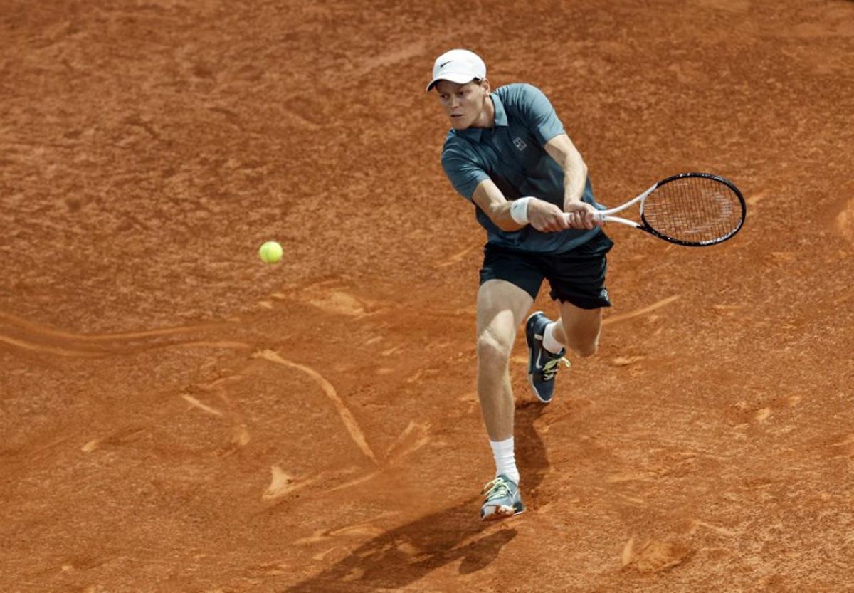 Italy's Jannik Sinner returns a ball to Spain's Rafael Jodar during their 2026 ATP Tour Madrid Open tennis tournament quarterfinal singles match at the Caja Magica in Madrid, on April 29, 2026. OSCAR DEL POZO / AFP
