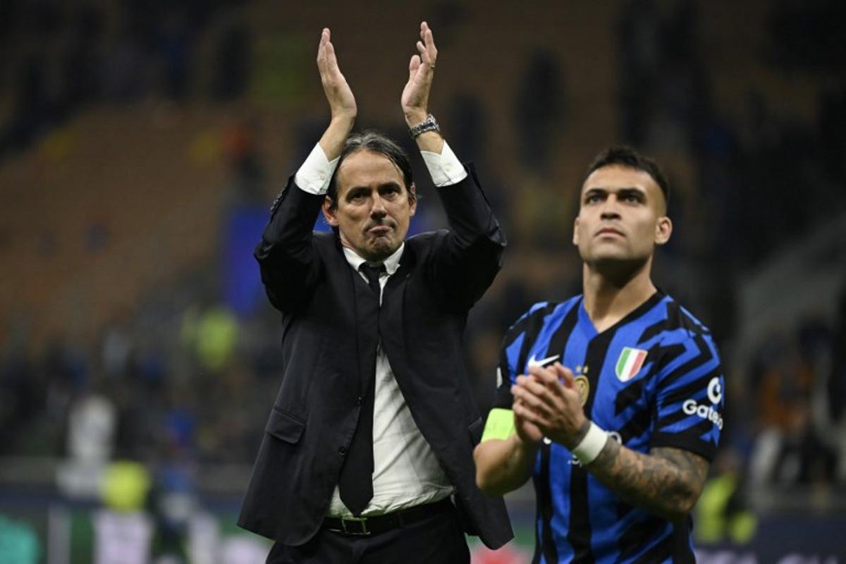Inter Milan's Italian coach Simone Inzaghi (C) celebrates after Inter Milan won the UEFA Champions League semi-final second leg football match between Inter Milan and FC Barcelona at the San Siro stadium in Milan on May 6, 2025. PIERO CRUCIATTI / AFP