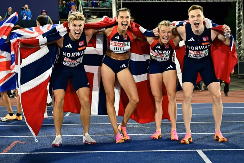 Gold medallists Norway's Andreas Ofstad Kulseng, Norway's Amalie Iuel Norway's Henriette Jaeger and Norway's Karsten Warholm celebrate after competing in the mixed 4x400m relay final during the European Athletics Championships at Alexander Stadium in Birmingham on August 10, 2026. Ben STANSALL / AFP