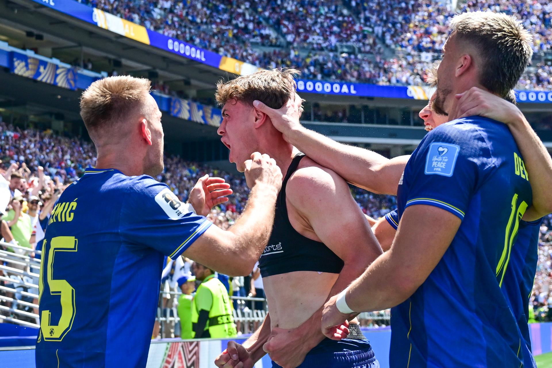 Bosnia and Herzegovina's Ermin Mahmic celebrates after scoring during a soccer game between Bosnia and Herzegovina and Qatar, on Wednesday 24 June 2026 in Seattle, the third and last day in the group stage, in group B of the FIFA World Cup 2026 in the United States of America. BELGA PHOTO DIRK WAEM