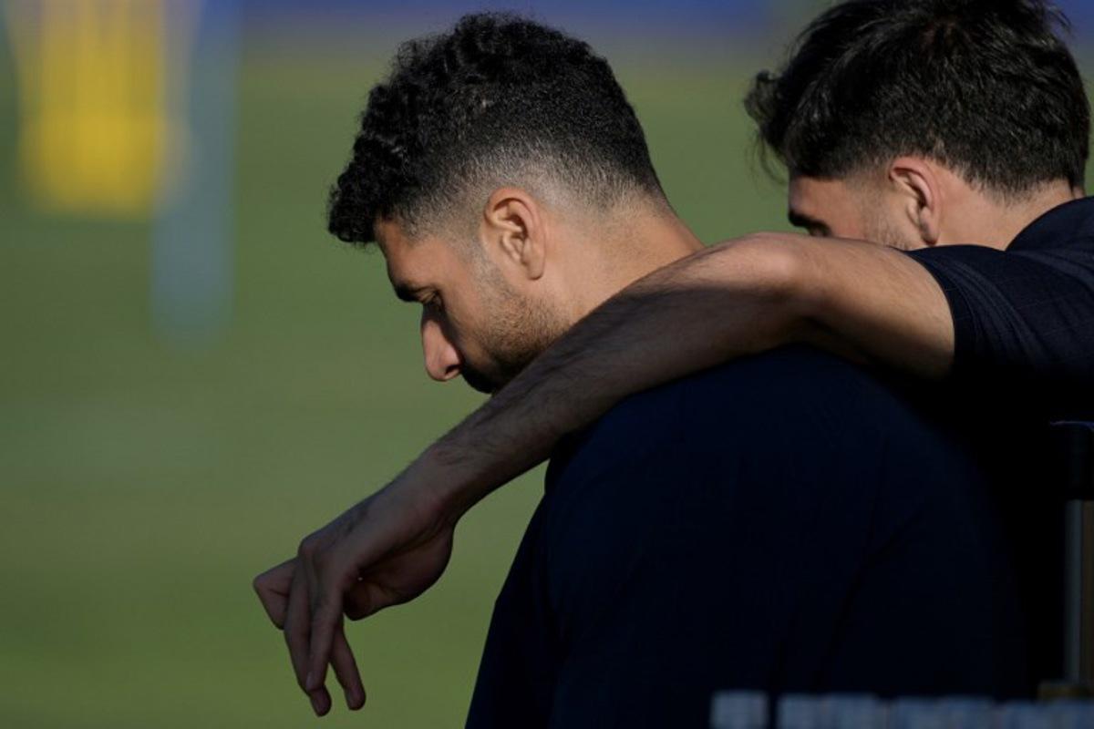 Iran's forward #09 Mehdi Taremi (L) and Iran's midfielder #07 Alireza Jahanbakhsh are seen during a training session at Centro Xoloitzcuintle in Tijuana, on June 22, 2026, during the 2026 World Cup football tournament. Guillermo Arias / AFP