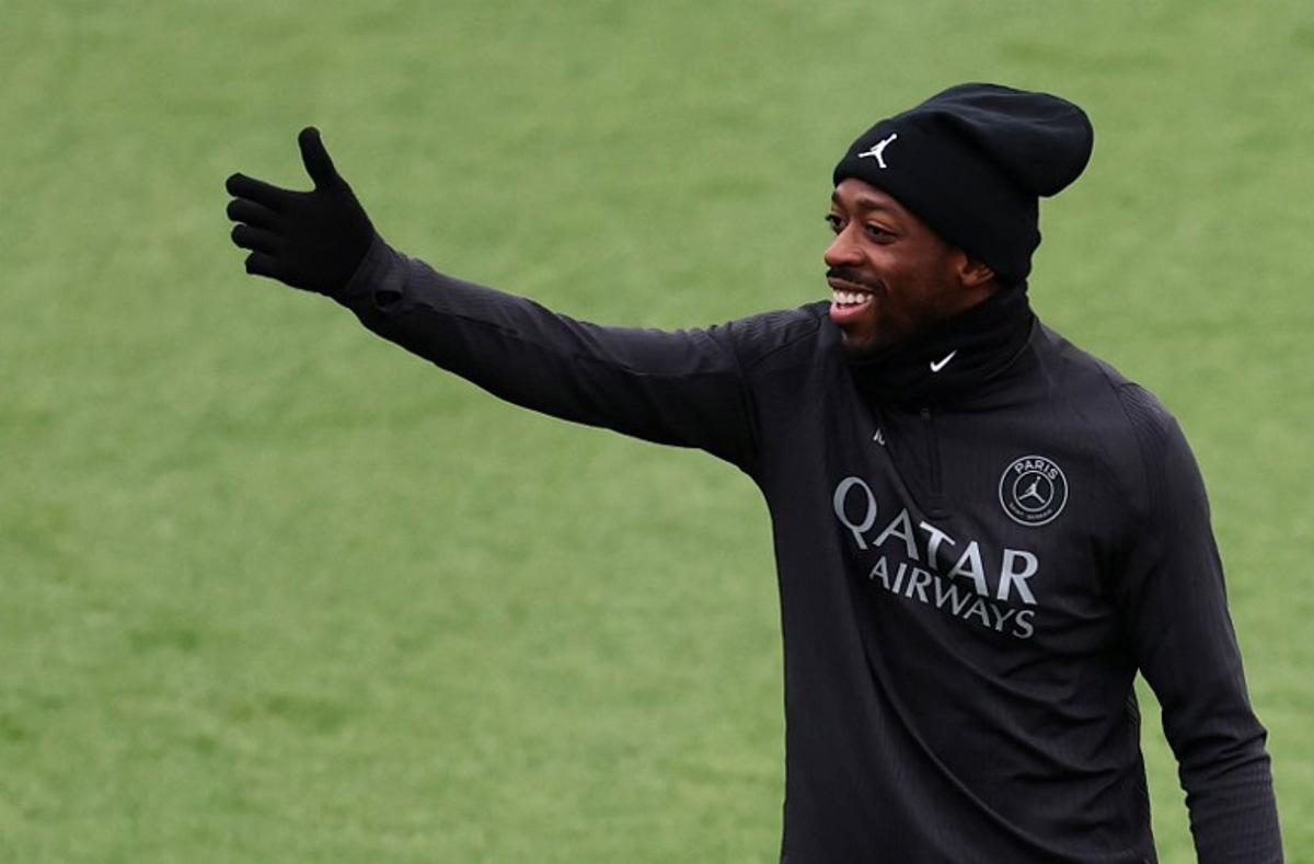 Paris Saint-Germain's French forward #10 Ousmane Dembele gestures during a training session at the Campus Paris Saint-Germain in Poissy, in the western outskirts of Paris, on November 25, 2025, on the eve of the UEFA Champions League first round day 5 football match between Paris Saint-Germain and Tottenham Hotspur. FRANCK FIFE / AFP