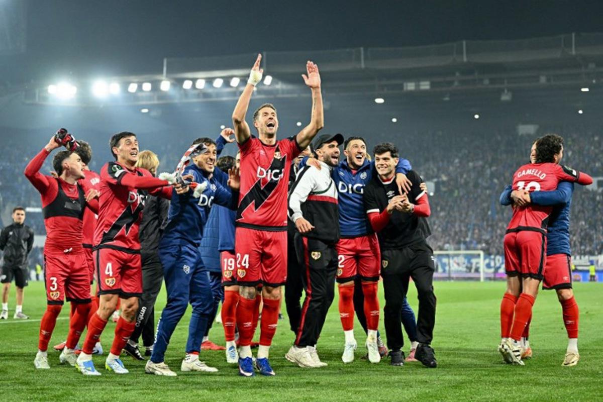 Rayo Vallecano's players celebrate after winning the UEFA Conference League semi-final second leg football match between RC Strasbourg Alsace and Rayo Vallecano de Madrid at Stade de la Meinau in Strasbourg, eastern France on May 7, 2026. SEBASTIEN BOZON / AFP