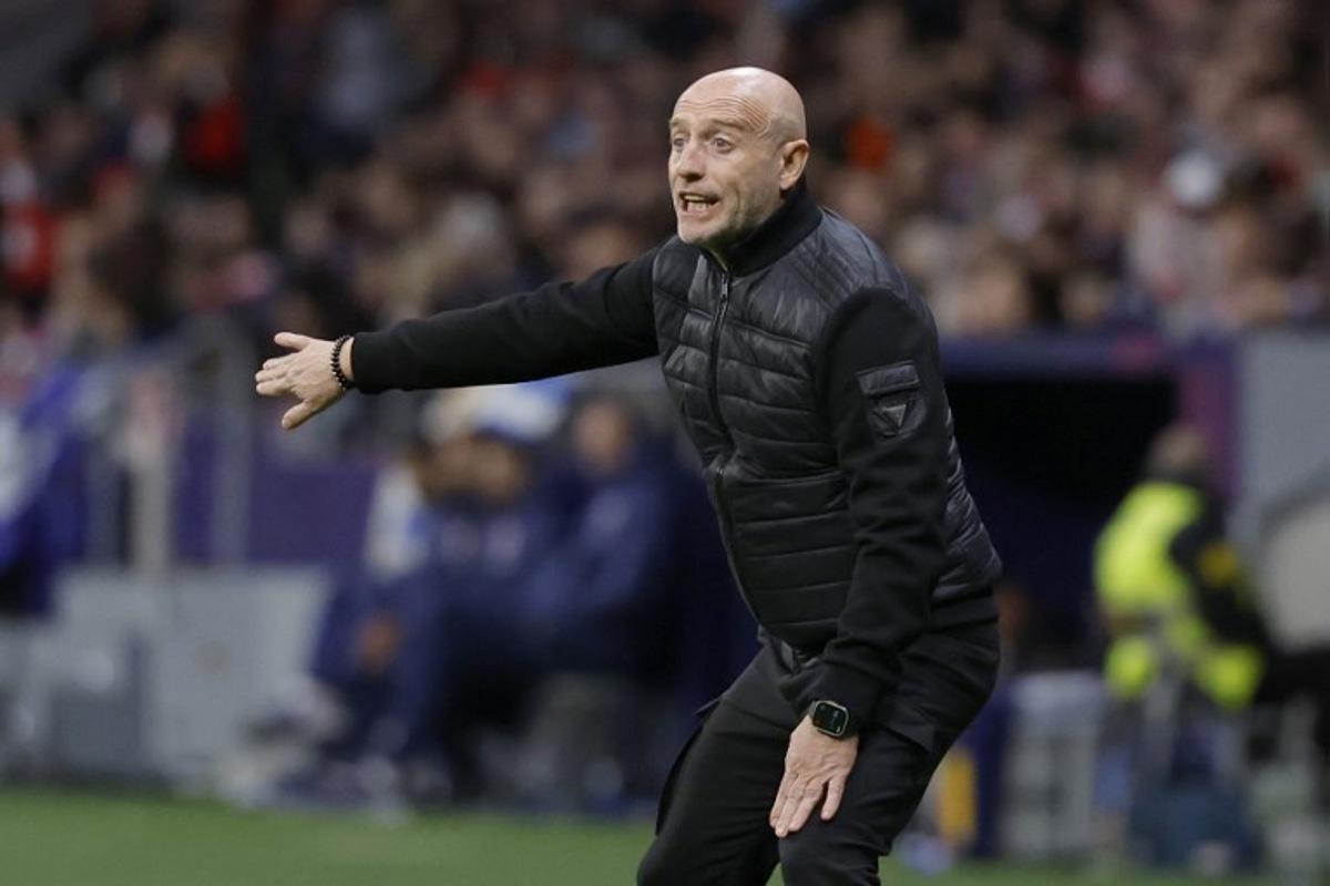 Levante's Spanish coach Julian Calero gestures on the touchline during the Spanish league football match between Club Atletico de Madrid and Levante UD at Metropolitano Stadium in Madrid on November 8, 2025. Oscar DEL POZO / AFP