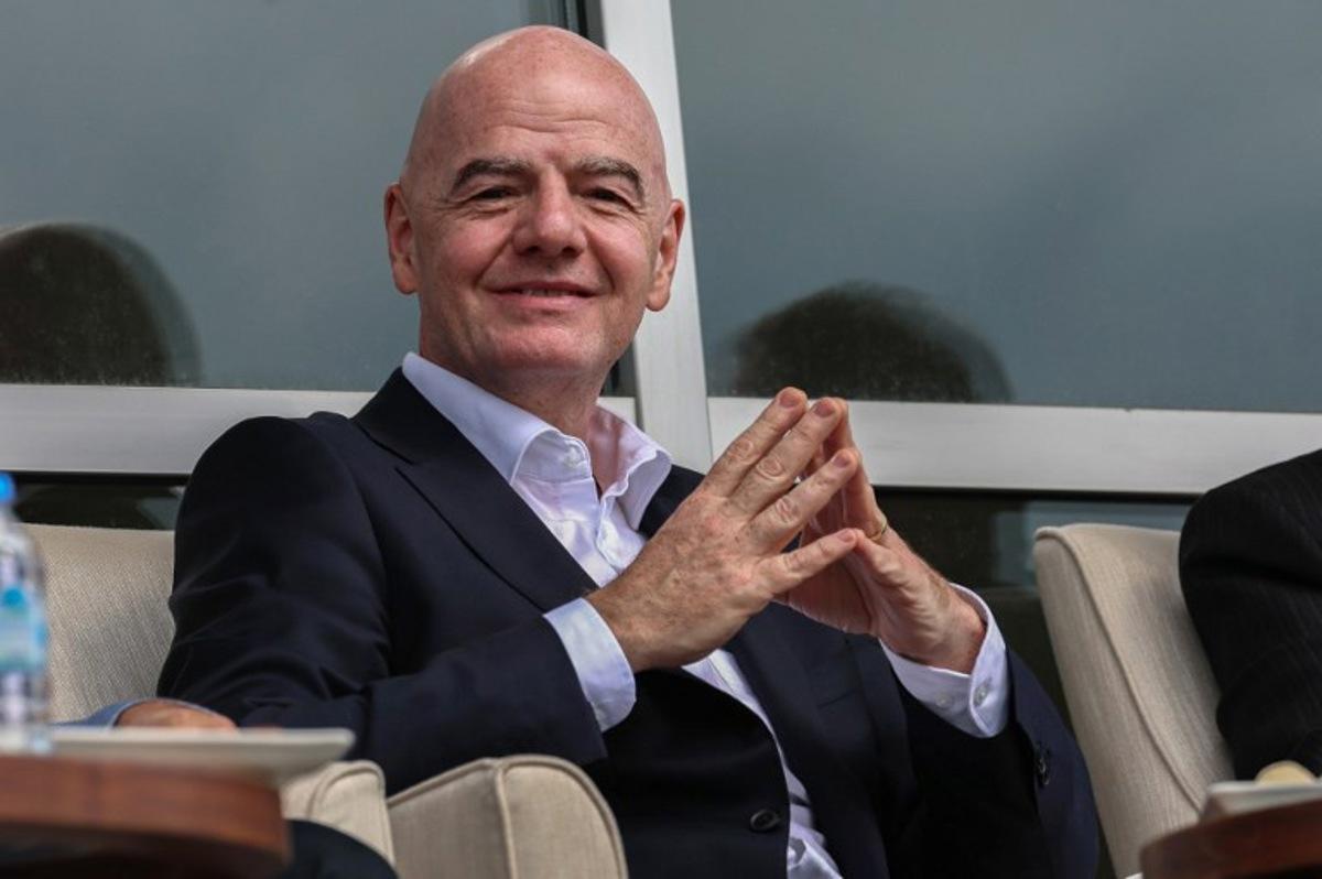 FIFA's President Gianni Infantino (C) arrives to attend a friendly football match between Iran and Costa Rica, in Antalya, southern Turkey, on March 31, 2026. FIFA's president told AFP that Iran "will be at the World Cup" despite the Middle East war. Adem ALTAN / AFP