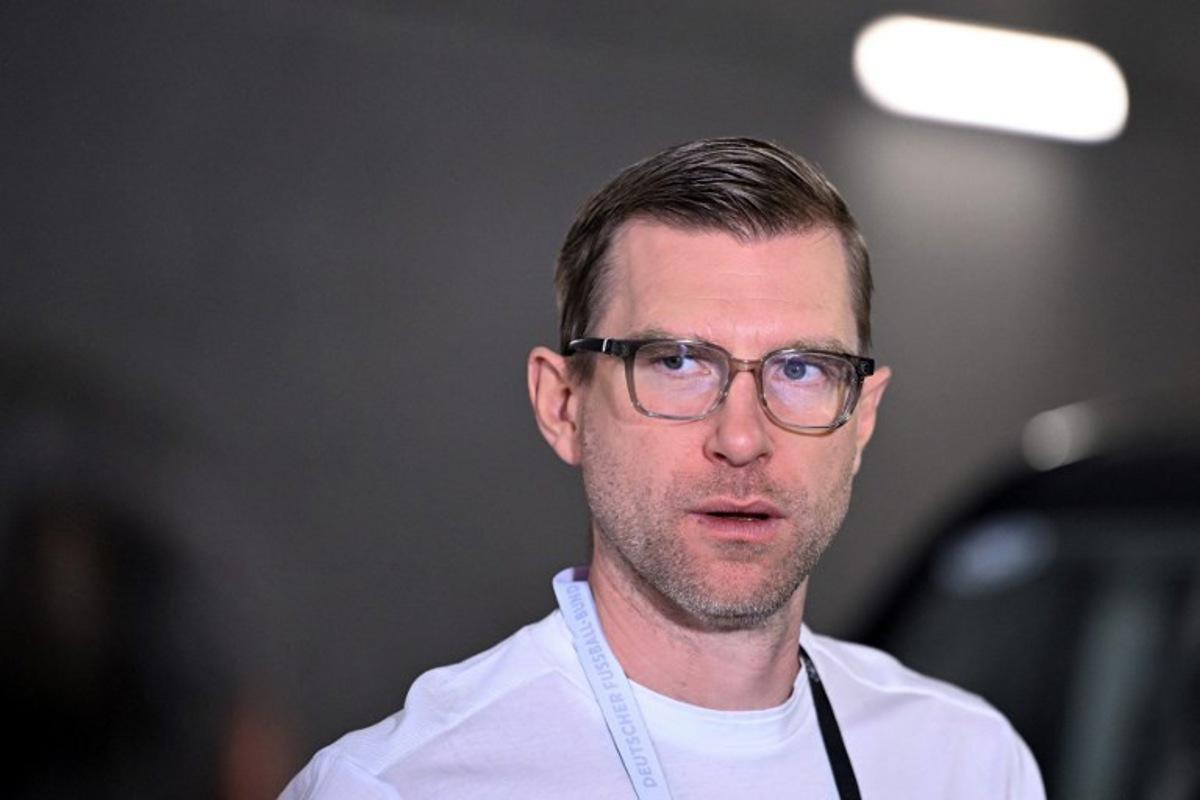 German coach and former footballer Per Mertesacker arrives at the Mewa Arena Stadium prior to a friendly match between Germany and Finland ahead of the 2026 FIFA World Cup football tournament, in Mainz, western Germany on May 31, 2026. Kirill KUDRYAVTSEV / AFP