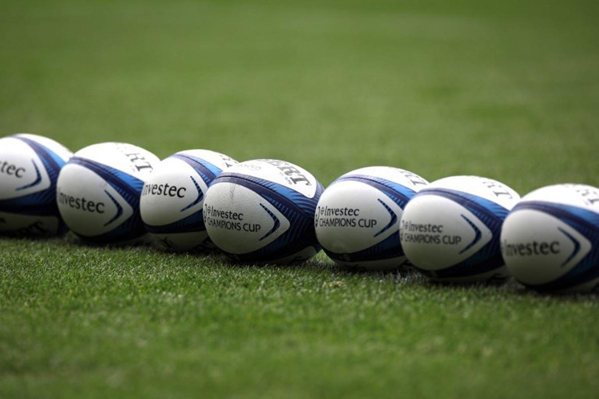 Rugby balls are lined up during a captain's run training session at the Stadium in Toulouse, southwestern France, on May 4, 2024, on the eve of the European Rugby Champions Cup demi-final rugby union match between Stade Toulousain Rugby (Toulouse) and Harlequins. Valentine CHAPUIS / AFP