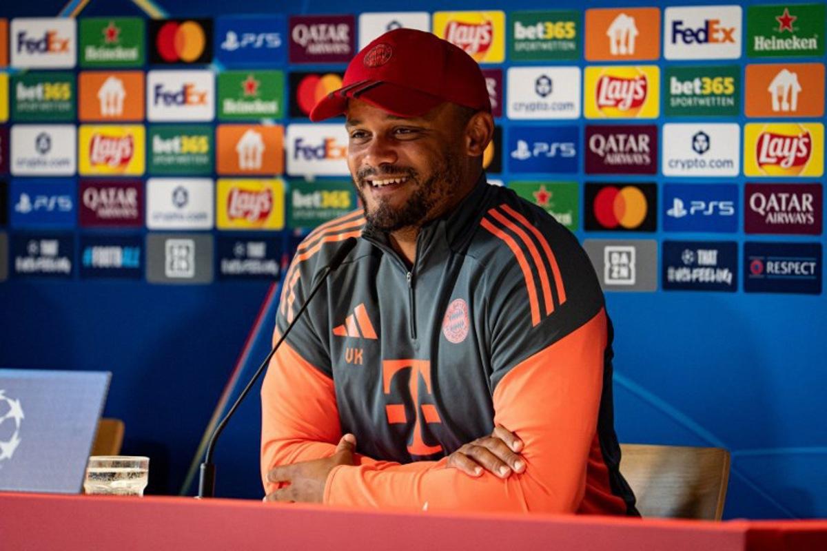 This handout photo provided by German first division football club FC Bayern Munich and taken on September 16, 2025 shows Bayern Munich's Belgian head coach Vincent Kompany addressing a press conference in Munich, southern Germany, ahead of the team's UEFA Champions League football match against Chelsea FC on September 17. Handout / BAYERN MUNICH / AFP