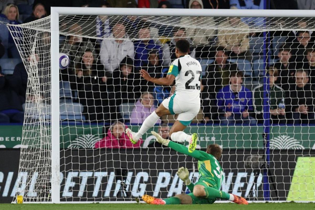 Newcastle United's English midfielder #23 Jacob Murphy scores their second goal during the English Premier League football match between Leicester City and Newcastle United at King Power Stadium in Leicester, central England on April 7, 2025. Darren Staples / AFP