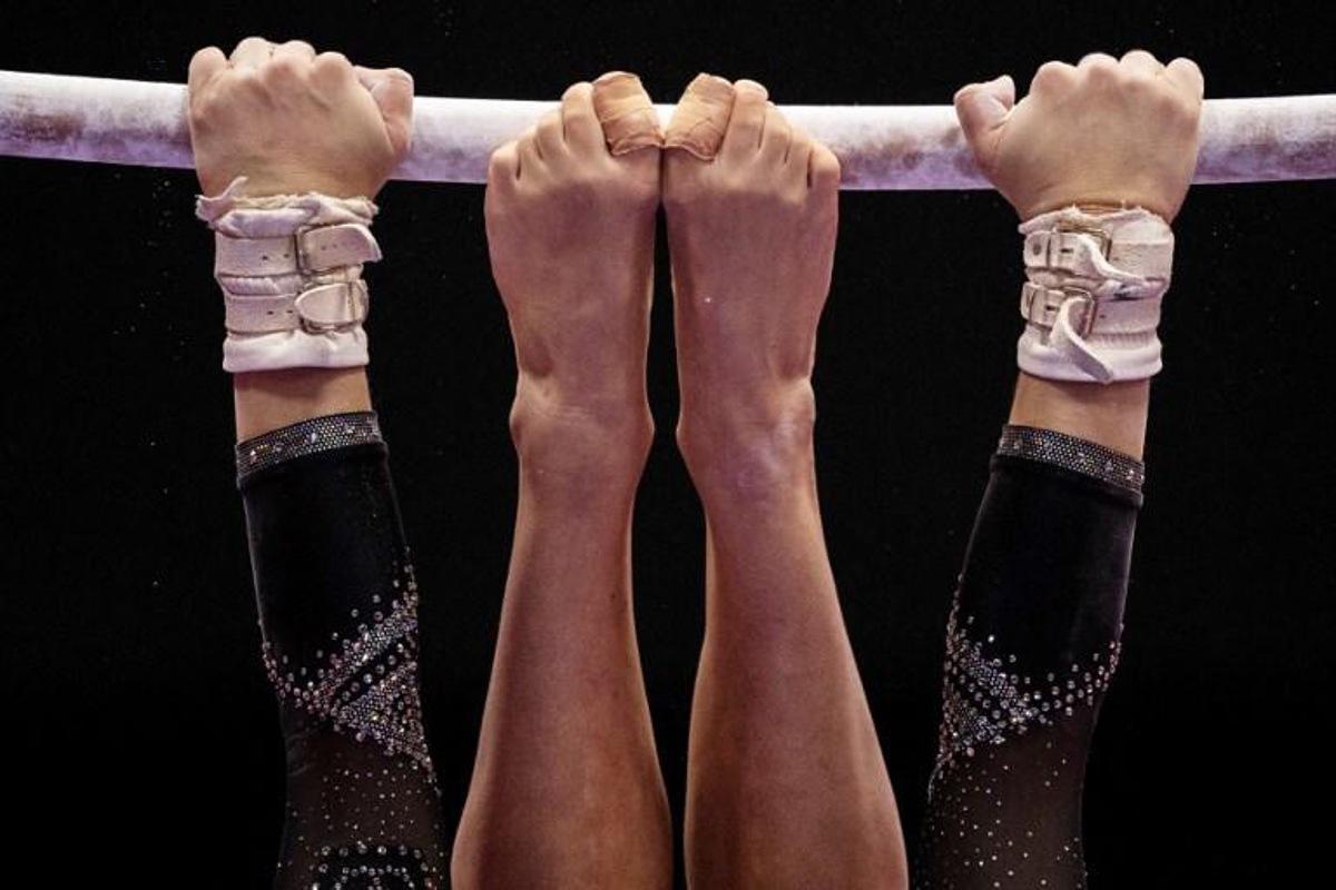 Italy's Asia D'amato competes in the uneven bars event at the women¿s team qualification during the Artistic Gymnastics World Championships at the Kitakyushu City Gymnasium in Kitakyushu, Fukuoka prefecture on October 18, 2021. Philip FONG / AFP