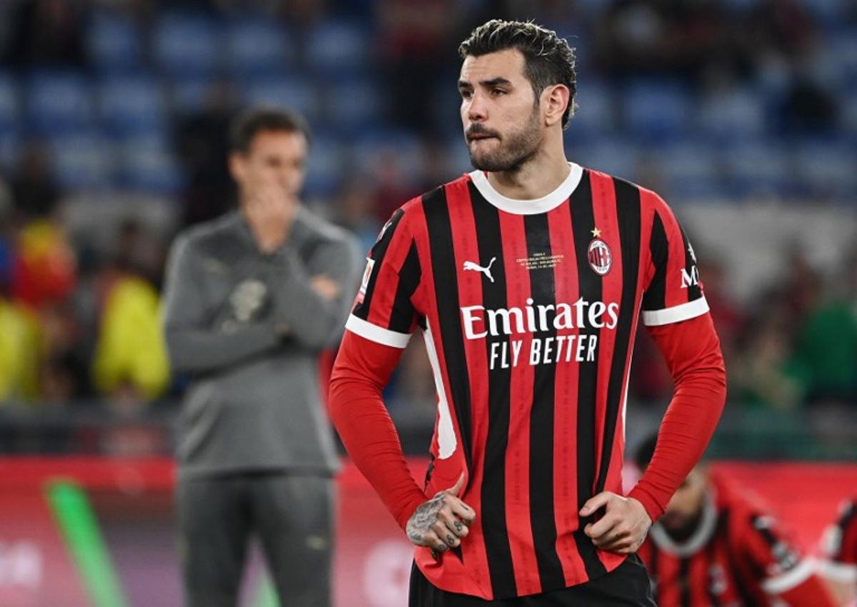 AC Milan's French defender #19 Theo Hernandez reacts at the end of the Italian Cup (Coppa Italia) final football match between AC Milan and Bologna at the Olympic stadium in Rome, on May 14, 2025. Isabella BONOTTO / AFP