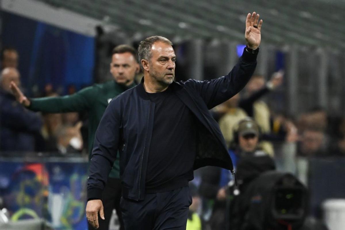 Barcelona's German coach Hans-Dieter Flick shouts instructions to his players from the touchline during the UEFA Champions League semi-final second leg football match between Inter Milan and FC Barcelona at the San Siro stadium in Milan on May 6, 2025. PIERO CRUCIATTI / AFP