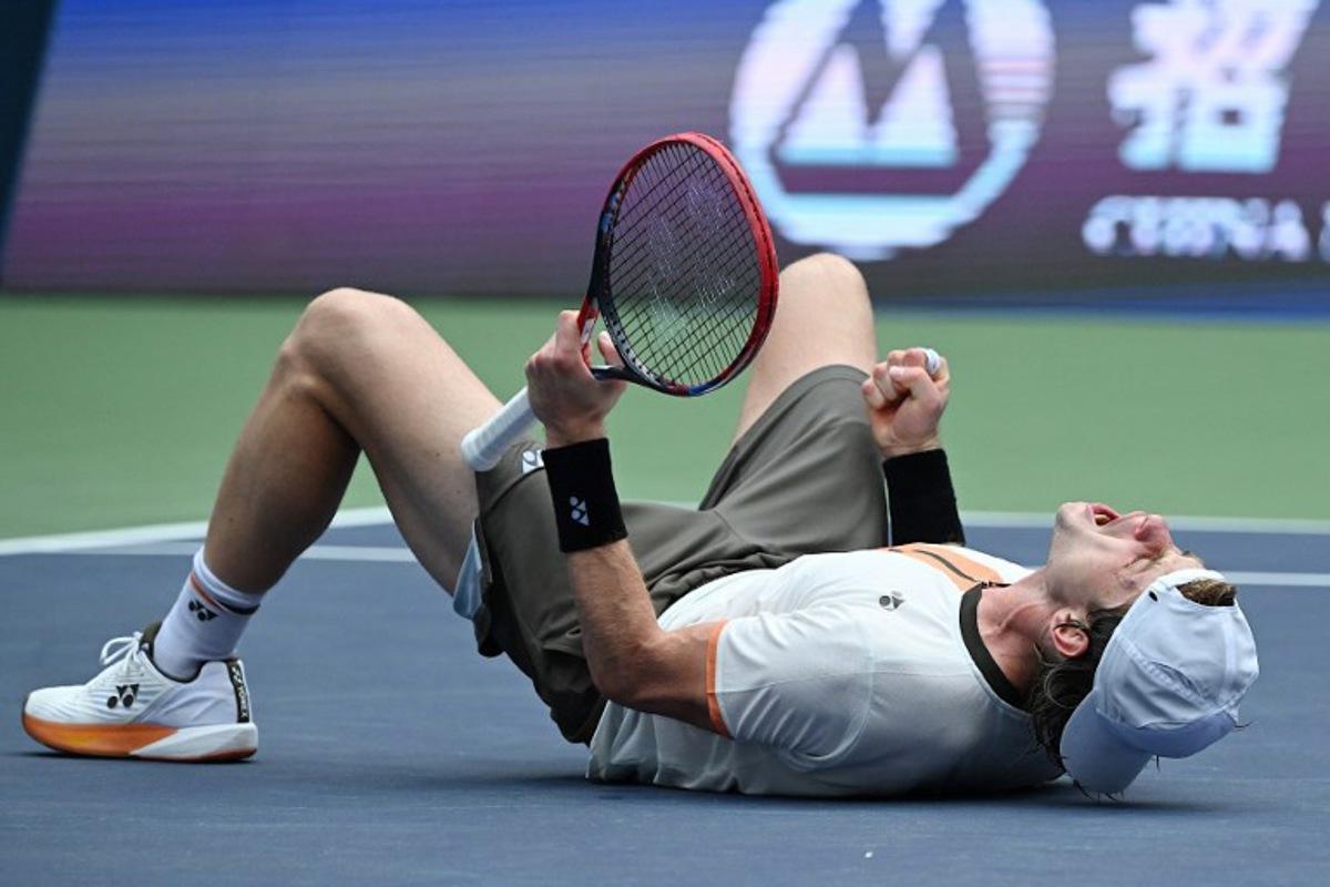 Belgium's Zizou Bergs celebrates after winning against Canada's Gabriel Diallo in their men's singles match at the Shanghai Masters tennis tournament in Shanghai on October 7, 2025. JADE GAO / AFP